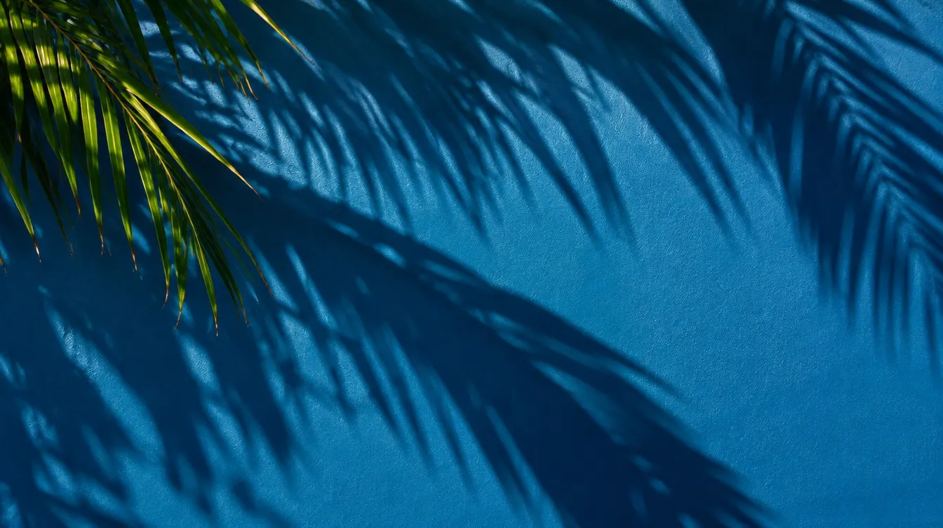 Palm shadows on a blue wall